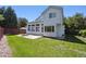 Spacious backyard with patio, lawn, and mature trees at 13362 Marion St, Thornton, CO 80241