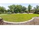 Community park with pond, grassy area, and gazebo at 3580 W 62Nd Pl, Denver, CO 80221