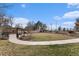 Landscaped community park with walking path and seating at 3580 W 62Nd Pl, Denver, CO 80221