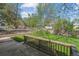 Enjoy this spacious backyard with mature trees, a wooden fence, and a concrete patio perfect for your outdoor enjoyment at 6882 Moore St, Arvada, CO 80004