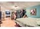 A basement bedroom leading to another room and featuring a closet at 7310 Carnation Pl, Commerce City, CO 80022