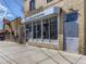 Exterior view of a Doxieperk's restaurant, showcasing its vintage-style storefront and unique architectural details at 3120 N Race St, Denver, CO 80205