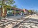 Street view of vintage brick buildings, newly renovated, with classic vintage-style storefronts, streetlights, and a brick-paved street at 3120 N Race St, Denver, CO 80205