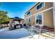 Backyard featuring a gazebo and a glimpse of the home's exterior at 24191 E Iowa Pl, Aurora, CO 80018