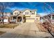 Inviting two-story home with a neutral color palette, attached garage, and nicely maintained front yard at 24191 E Iowa Pl, Aurora, CO 80018