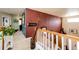 A hallway on the upper level showcases the home's architectural details and connects various rooms at 24191 E Iowa Pl, Aurora, CO 80018