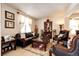 Comfortable living room boasts classic furniture, a decorative rug, and ample space for relaxing at 24191 E Iowa Pl, Aurora, CO 80018