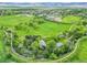 Stunning aerial view of the property showcasing the house, expansive yard, and surrounding landscape at 7800 Indiana St, Arvada, CO 80007