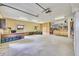Spacious garage with work bench, storage, and ample room for vehicles and projects at 7800 Indiana St, Arvada, CO 80007