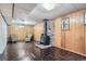 A wood-paneled basement with a vintage wood-burning stove at 6991 Warren Dr, Denver, CO 80221