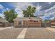 Charming brick home with a well-kept front yard and a cozy, welcoming entrance at 6991 Warren Dr, Denver, CO 80221