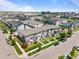 Aerial view showcasing community homes with well-maintained lawns and streets at 4774 Kittredge St, Denver, CO 80239