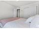 Bedroom featuring white walls and a large closet at 4774 Kittredge St, Denver, CO 80239