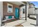 Welcoming front porch with seating area, perfect for relaxing and enjoying the outdoors at 4774 Kittredge St, Denver, CO 80239