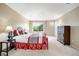 Spacious bedroom with ample natural light and neutral tones; comfortable retreat at 13078 Monaco Way, Thornton, CO 80602