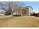 Beautiful home featuring brick accents, manicured landscaping, and a well-maintained lawn at 13078 Monaco Way, Thornton, CO 80602