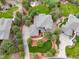 This aerial view showcases the home's spacious lot, backyard fire pit, and a long private driveway at 4586 Carefree Trl, Parker, CO 80134