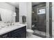 Contemporary bathroom features a stylish vanity and walk-in shower at 4586 Carefree Trl, Parker, CO 80134