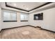 Bonus room with carpet, tray ceiling, trim lighting and natural light at 4586 Carefree Trl, Parker, CO 80134