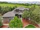 The home features amazing curb appeal, mature trees, and is located on a golf course at 4586 Carefree Trl, Parker, CO 80134