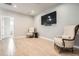 Spacious living room features comfortable seating and a large-screen TV at 4586 Carefree Trl, Parker, CO 80134