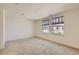 Bedroom with two windows and neutral walls at 19753 E 54Th Ave, Denver, CO 80249