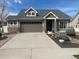 Charming single-Gathering home with a well-maintained lawn and inviting curb appeal at 19753 E 54Th Ave, Denver, CO 80249