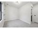 Bright bedroom with soft carpet, natural light, and neutral color palette at 2162 S Ash St, Denver, CO 80222