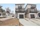 Modern two-story home featuring dual balconies and a convenient attached garage at 2162 S Ash St, Denver, CO 80222