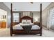 Bedroom with a four-poster bed and neutral carpet and gray walls at 16278 E 105Th Way, Commerce City, CO 80022