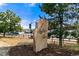 Stone community entrance sign for Buffalo Run surrounded by landscaping on a sunny day at 16278 E 105Th Way, Commerce City, CO 80022