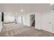Open basement space featuring recessed lighting, carpet, and easy access stairs at 3150 W Stanford Ave, Englewood, CO 80110