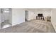 Spacious finished basement with new carpeting, and a comfortable entertainment area at 3150 W Stanford Ave, Englewood, CO 80110