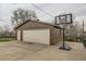 Spacious two-car garage with attached basketball hoop at 3150 W Stanford Ave, Englewood, CO 80110