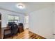 Bright office featuring a desk, chair, window, and hardwood floors at 3150 W Stanford Ave, Englewood, CO 80110