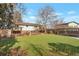 Large backyard offers plenty of space for recreation and outdoor activities at 11886 W 107Th Ave, Westminster, CO 80021