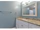 Stylishly remodeled bathroom with granite vanity, modern lighting, and sleek fixtures at 11886 W 107Th Ave, Westminster, CO 80021