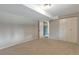 Bedroom featuring neutral walls, carpet, and a door that leads out of the room at 11886 W 107Th Ave, Westminster, CO 80021