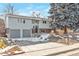 Charming two-story home featuring an attached two-car garage and a well-maintained front yard at 11886 W 107Th Ave, Westminster, CO 80021