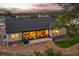 Aerial view of back yard with patio, fire pit and outdoor seating at 9228 Lone Timber Ct, Parker, CO 80134