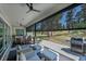 Inviting covered patio with comfortable seating and a barbecue, ideal for outdoor gatherings at 9228 Lone Timber Ct, Parker, CO 80134