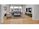 Cozy living room with large windows and a neutral color palette at 9228 Lone Timber Ct, Parker, CO 80134