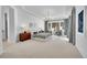 Large primary bedroom with a tray ceiling, natural light, and stylish decor at 9228 Lone Timber Ct, Parker, CO 80134