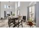Dining room features lots of light and a modern chandelier at 10767 Appaloosa Ct, Parker, CO 80134