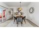 Cozy dining room featuring modern decor, seating for four, and lots of light at 8424 Everett Way # E, Arvada, CO 80005