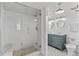 Bright and renovated bathroom features a large tiled shower at 1740 Trenton St, Denver, CO 80220