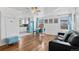 Inviting living room with hardwood floors, a modern kitchen, and plenty of natural light at 1740 Trenton St, Denver, CO 80220