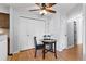 Dining area with a ceiling fan, closet space, and wooden table and chairs at 2800 Kalmia Ave # B209, Boulder, CO 80301