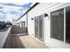 Private balcony offers outdoor seating and a view of the neighborhood at 5810 W 39Th Pl, Wheat Ridge, CO 80212