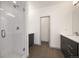 Sleek bathroom with tiled walk-in shower and modern double vanity at 5810 W 39Th Pl, Wheat Ridge, CO 80212